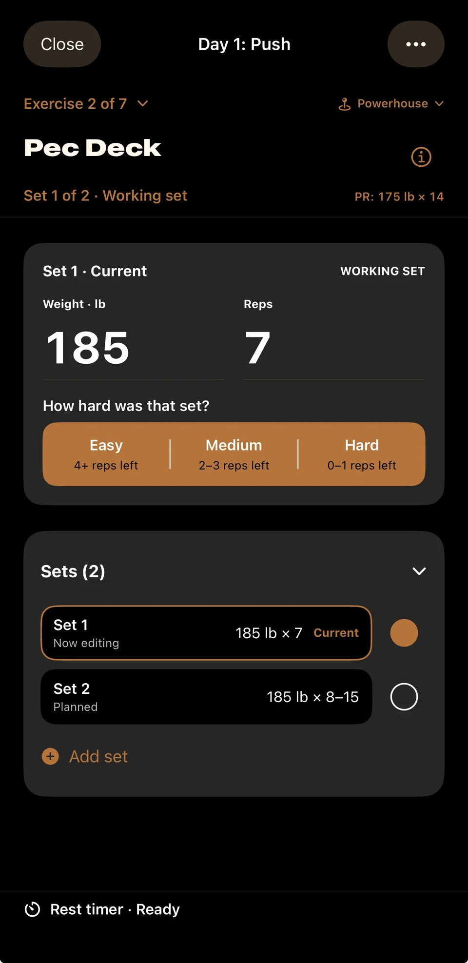 Dark-mode workout with weight and rep logging, effort choices, saved sets, and rest timer